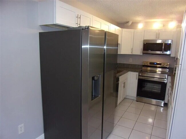 Photo - 2-Bed, 2-Bath Condo Retreat in Serene Tarpon Springs Oasis! Unidad #C2