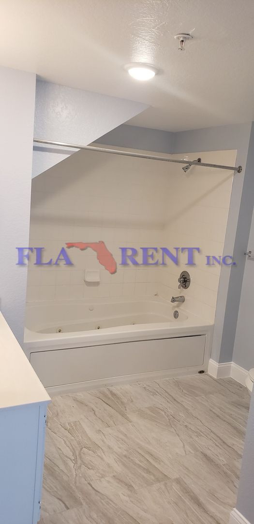 Photo - 4 BR / 3 FULL BATH (INCLUDES 2 MASTERS) 2 STORY (NEAR DISNEY!) GATED COMMUNITY WITH COMMUNITY POO...