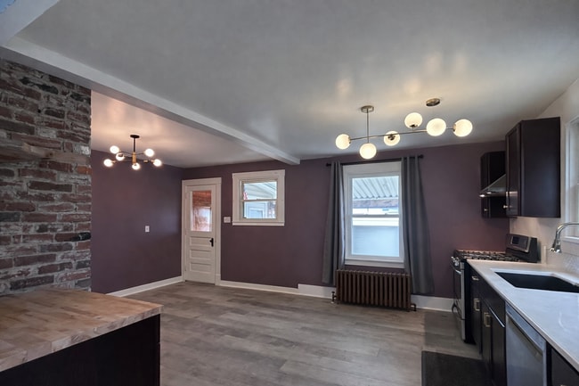 Photo - Spacious Single-Family Home w/Sunroom partially finished basment| Pet Friendly | Shaler