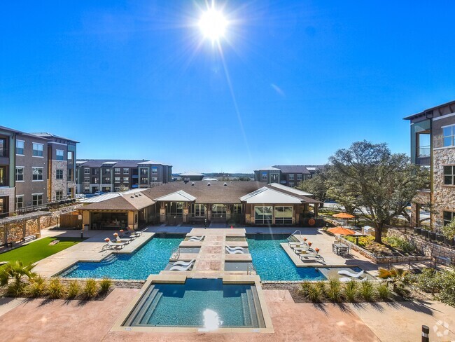 Resort-style Swimming Pool with Tanning Ledges - Bexley Wolf Ranch Rental