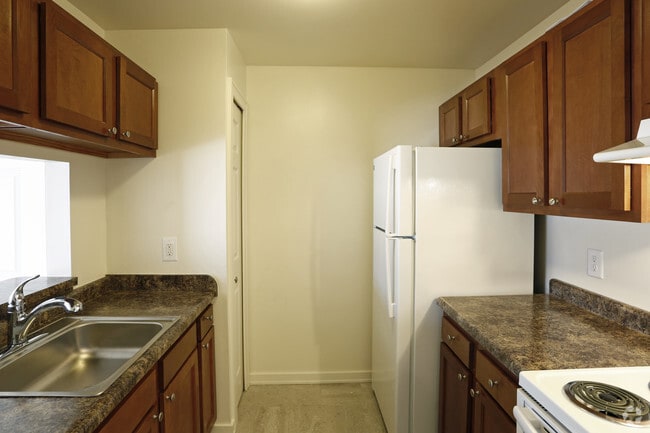 Beautiful Wood Cabinetry on Select Units - Warris Farms Apartments