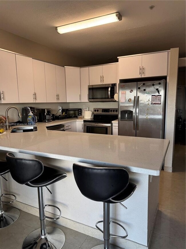 Building Photo - 6940 NW 179th St Rental