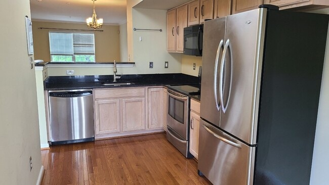 Photo - Spacious & Sunny 2Bed/2Bath End Unit in The Village at Town Center