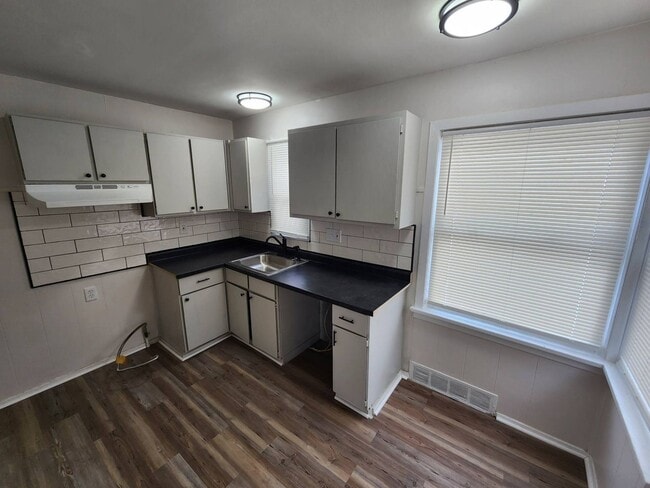 Photo - 2-Bedroom + Bonus Room Bungalow with Basement – Flexible Living Space