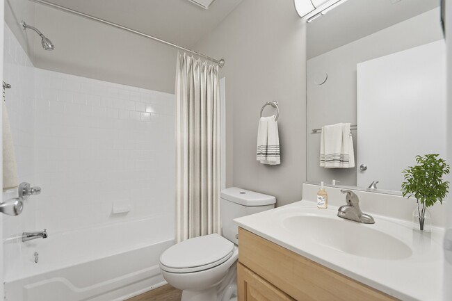 Welcome to Eagle Rock Apartments at Belcamp, where modern design meets daily comfort. This stylish bathroom offers convenience with sleek fixtures and ample space. Elevate your living experience today—schedule a tour now! - Eagle Rock Apartments at Belcamp