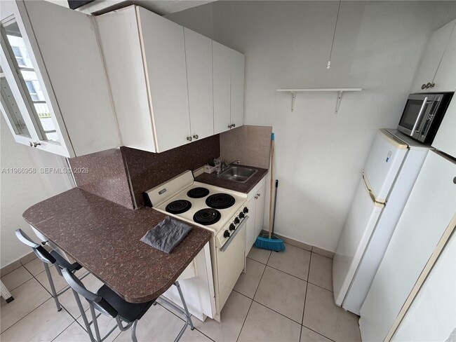 Photo - 301 86th St Unidad 303-1