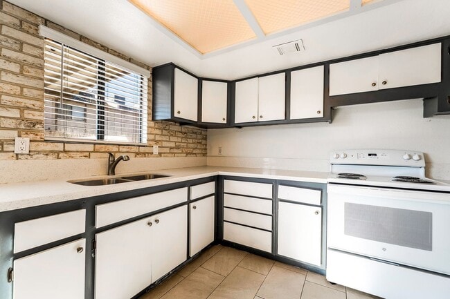 Photo - Immaculate two story townhome style condo ...