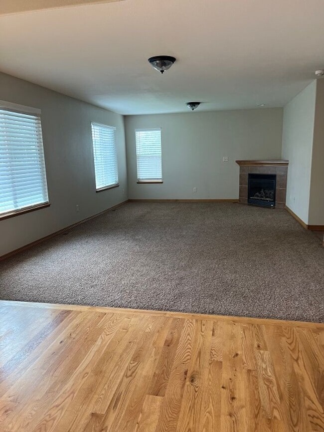 Photo - Spacious 5-Bedroom Home with Finished Basement and 3-Car Garage in Wellington