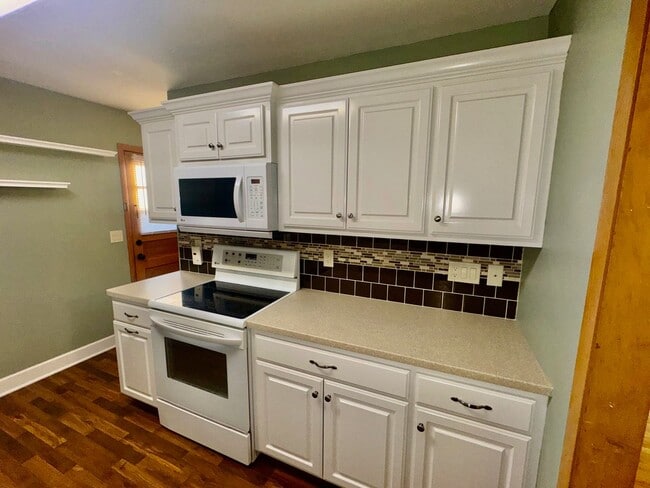 Photo - Bright and Spacious 3-Bedroom Home with Flexible Living Space