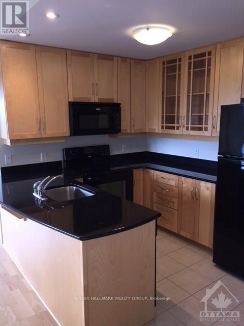 Photo - 314 Central Park Dr Unité 1010