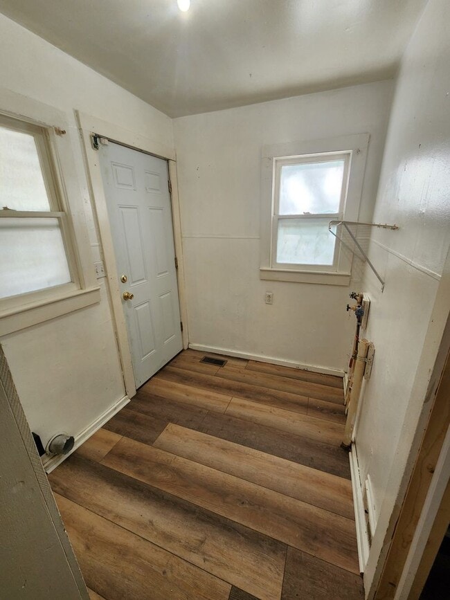 Photo - Nice home with oversized 2car gar with work bench and large shaded yard. Country-like setting