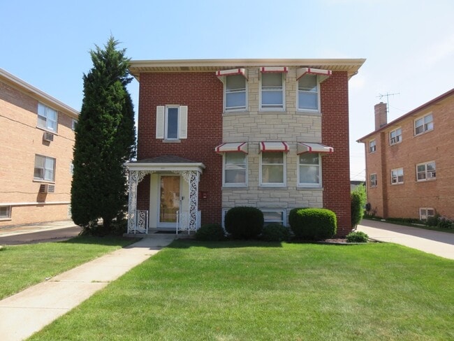 Building Photo - 8417 W Berwyn Ave Unit 2