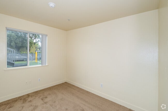 3BR, 2BA - 1,100SF - Bedroom - Pacific Rim Apartments