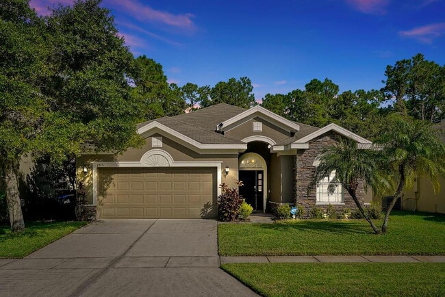 Photo - "Stunning 3BR Orlando Home with Private Screened Pool, Spa & Spacious Living Areas"