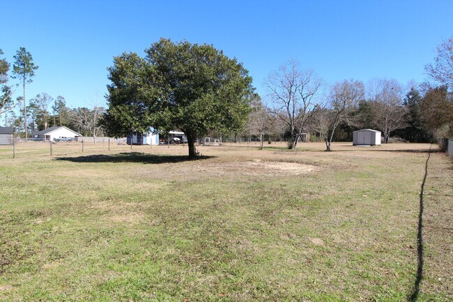 Photo - Charming 3-Bedroom Brick Home on Half an A...