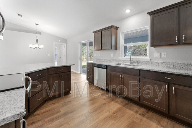 Building Photo - 9461 N Sandree Dr Rental