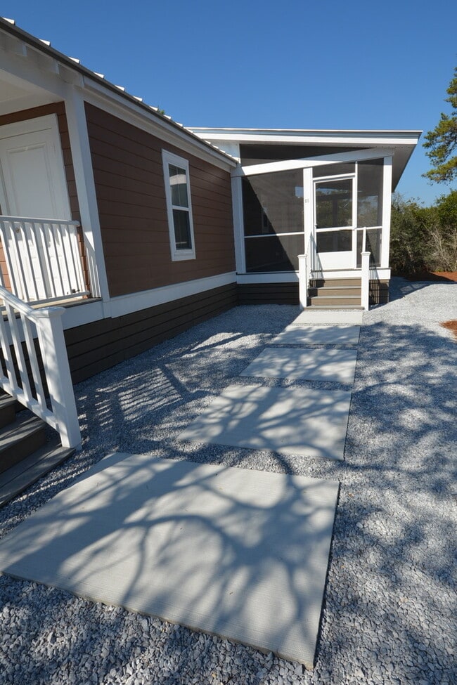 Photo - AVAILABLE 6/10/26 Adorable 2 bedroom cottage available long term off 30A! Huge screened in porch ...