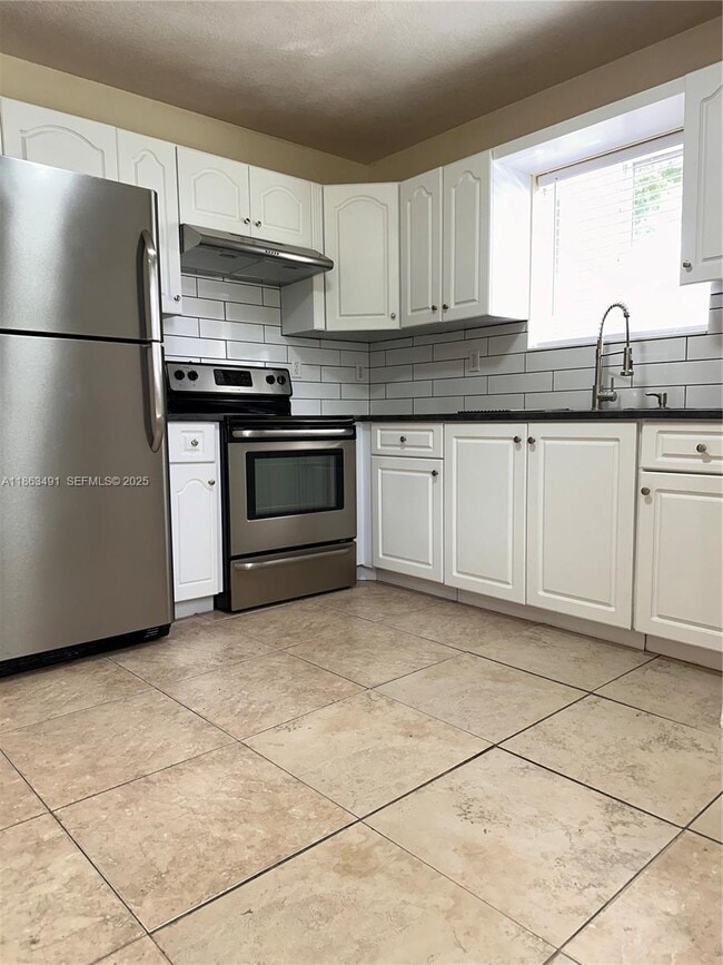 Building Photo - 1465 NW 59th St Unit 1465