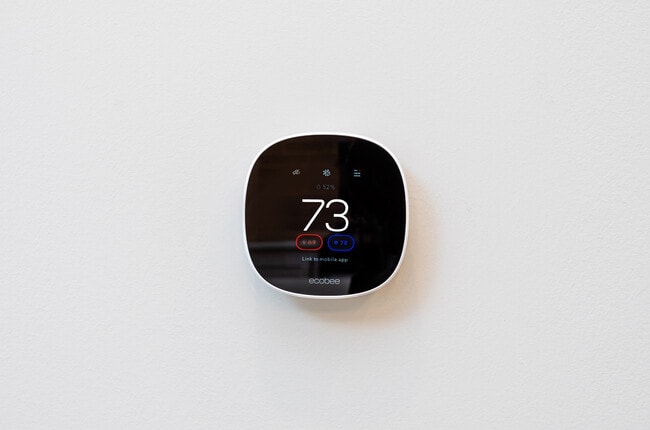 Smart programmable thermostat