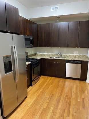Building Photo - 44 N Paulina St Unit C3 Rental