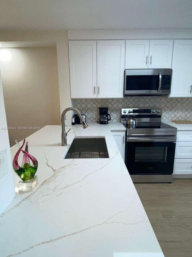 Photo - 7350 Kinghurst Dr Unit 305