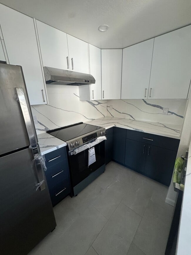 Photo - Beautifully Updated 2BD/2BA Condo | In-Unit Laundry, Garage & Greenbelt Views