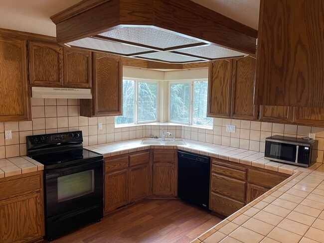 Photo - Magalia 3 bedroom 2 bath home, attached garage, low maintenance yard, california room