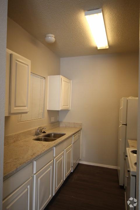 Building Photo - 12166 Metric Blvd Unit 219 Rental