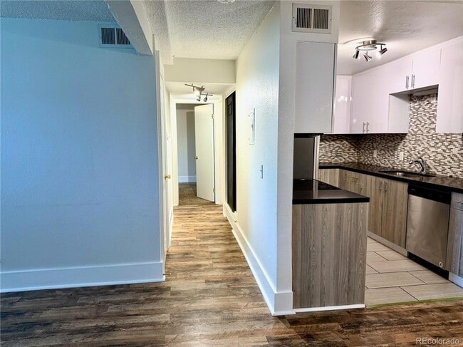 Building Photo - 16359 W 10th Ave Unit 1