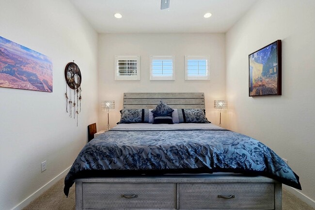 The King bed offers sound sleep, while a sofa bed in the lounge accommodates extra guests. - 22536 E San Tan Blvd Unit Spacious Guest Suit