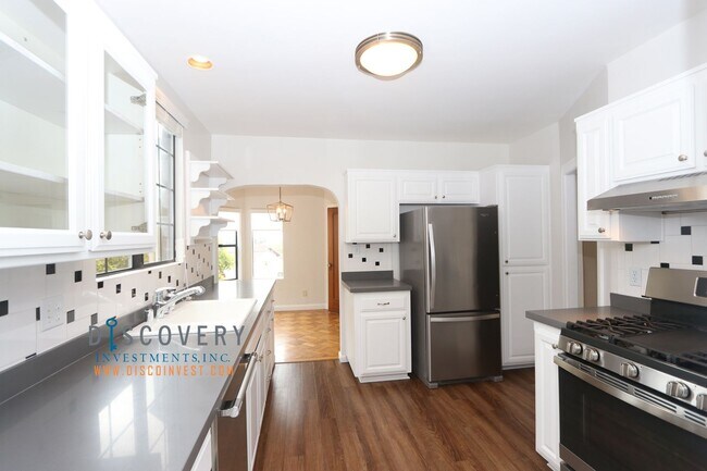 Photo - Oakmore Tudor with Large Backyard and Deck