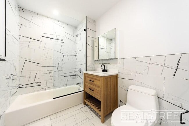 Photo - Modern New Construction 1-Bedroom Apartment with Premium Amenities – Prime Location Unit 2A