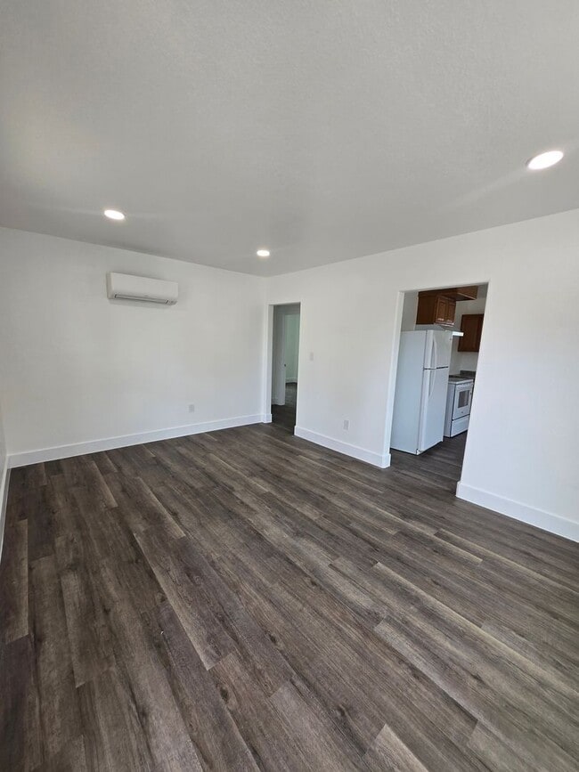 Photo - New paint and flooring throughout.