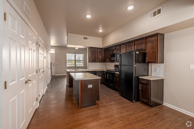 2BR, 1.5BA - 994SF - Kitchen and Dining Area - River West Apartments