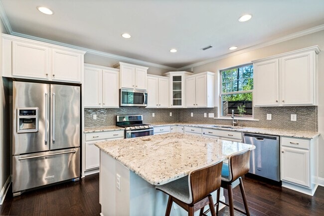 Photo - AVAILABLE IN MAY!  Stunning, like-new 4 bedroom, 4 bath home with large fenced yard!