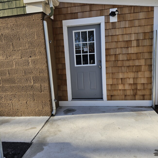 Private Entrance and patio area - 399 Woonasquatucket Ave Apartment Unit E