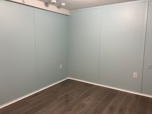 Photo - Single wide trailer on block foundation - ...