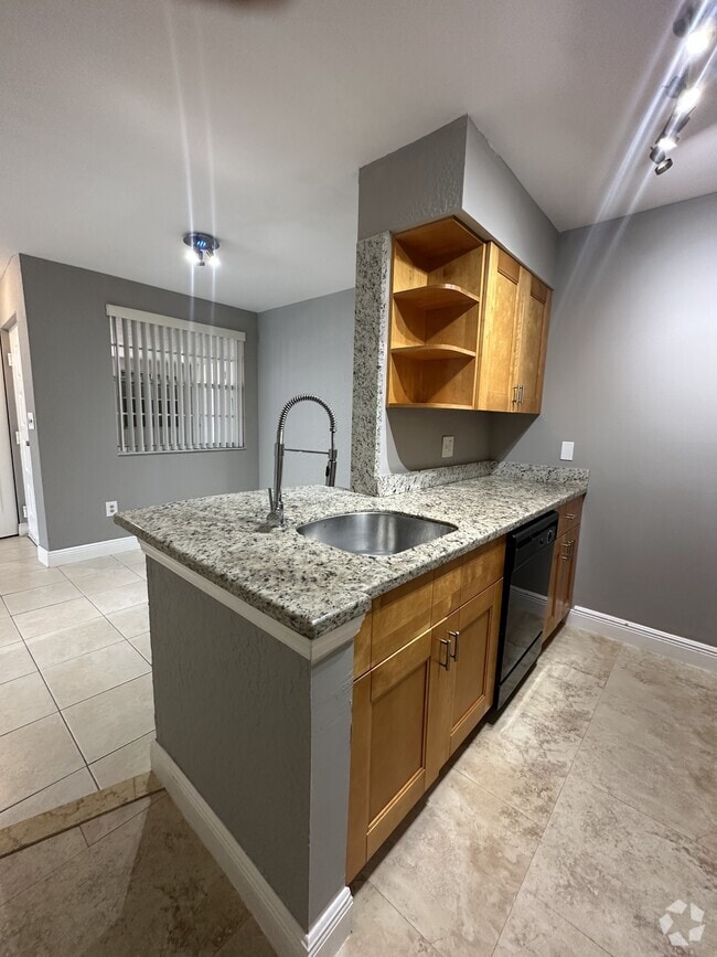 Building Photo - 2861 N Oakland Forest Dr Unit 107 Rental