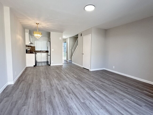 Photo - Move-in ready Evergreen townhome with private backyard, detached 2-car garage, and great communit...