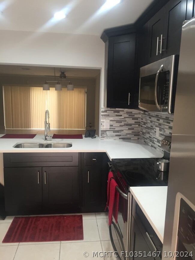 Photo - 3343 Carambola Cir S Unit 3343