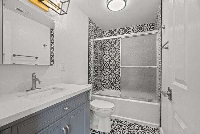 Modern renovated full bathroom with a tub - 411 124th St S Unit 411-B