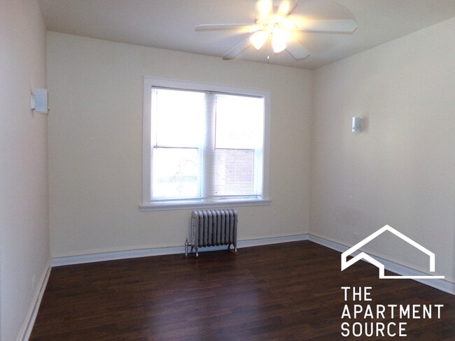 Building Photo - 6916 N Lakewood Ave Unit 210