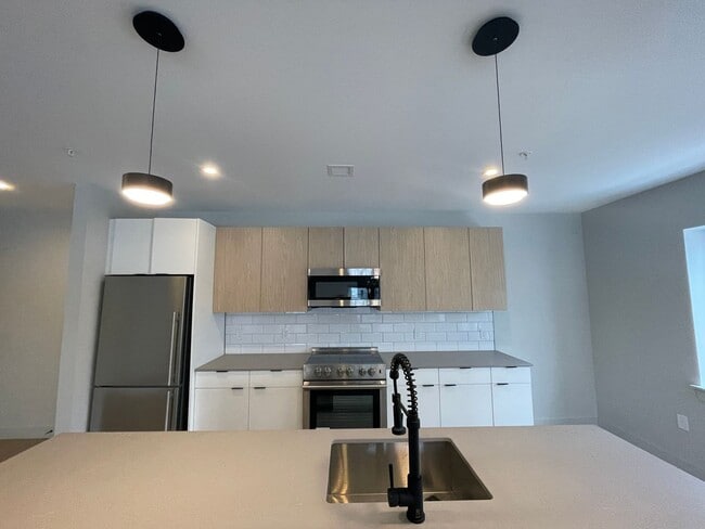 Photo - New construction condo available now!