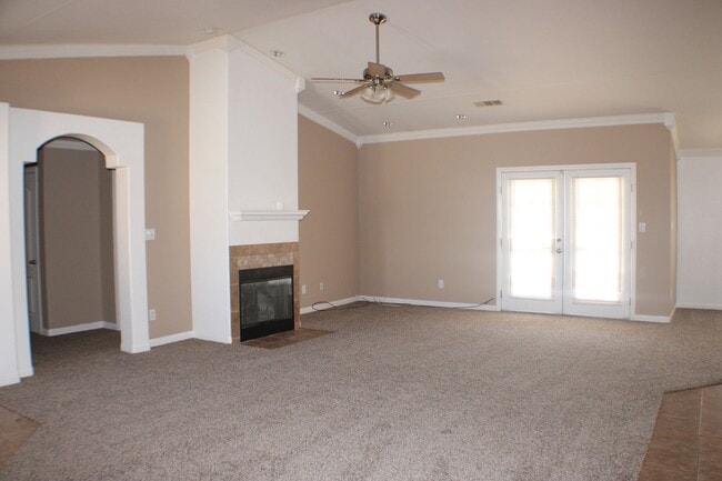 Photo - Charming 3-Bedroom Home with Fireplace, Spacious Backyard & Attached Garage in California City!