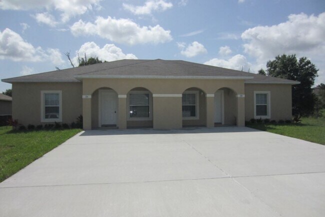 Building Photo - Duplex in Poinciana, Osceola County Rental