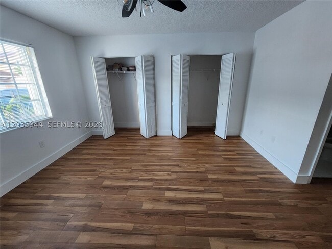 Building Photo - 10019 W Okeechobee Rd Unit 102