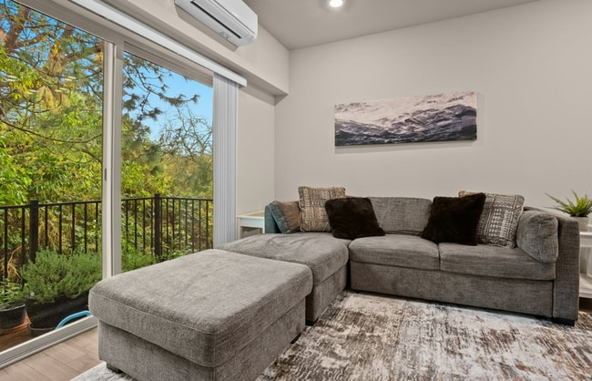 Photo - Modern 3-Bedroom Townhome-Style Home with Attached Garage, Private Patio & En-Suite Bathrooms in ...