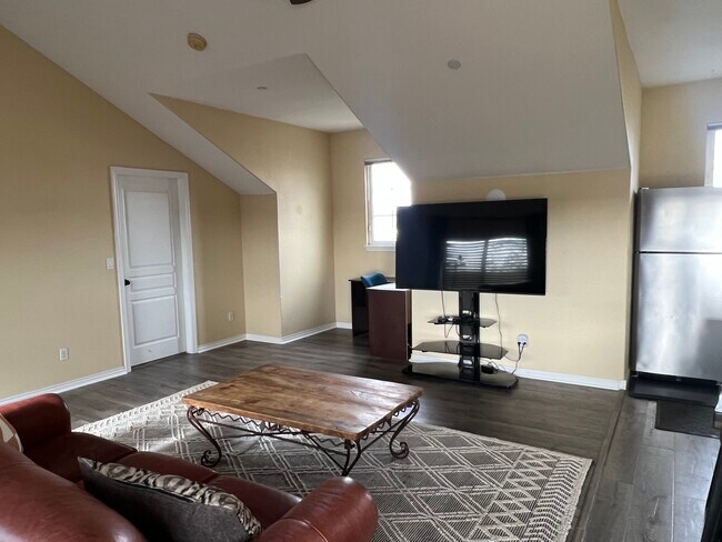 55 in smart tv - 15074 Lindark St Unit Loft Apartment