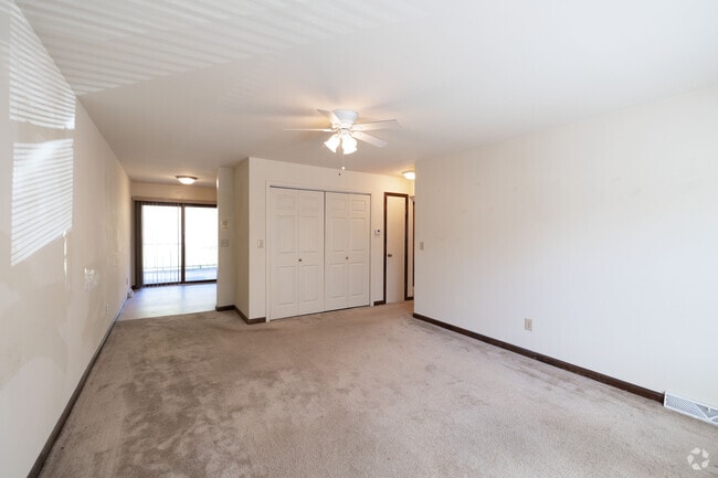 2BR, 1BA - 838SF - Living Room - Serafini Village