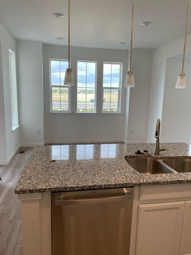 Photo - Spacious 4 Bed Townhome with 2-Car Garage in Erie-Available June 1!